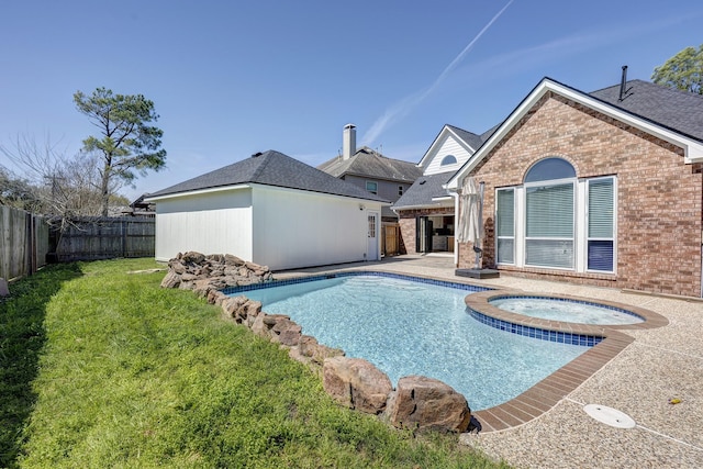 back of house featuring an in ground hot tub, brick siding, a fenced backyard, and a fenced in pool