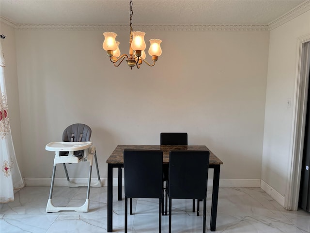 dining area featuring marble finish floor, a textured ceiling, baseboards, and an inviting chandelier