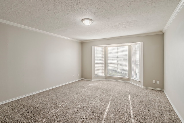 unfurnished room featuring carpet, a textured ceiling, baseboards, and crown molding