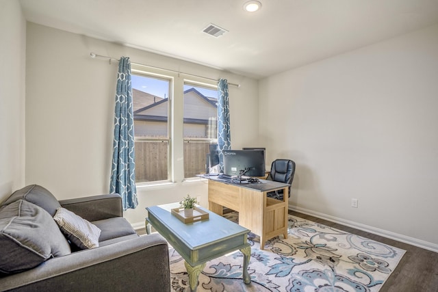 home office featuring recessed lighting, visible vents, baseboards, and wood finished floors