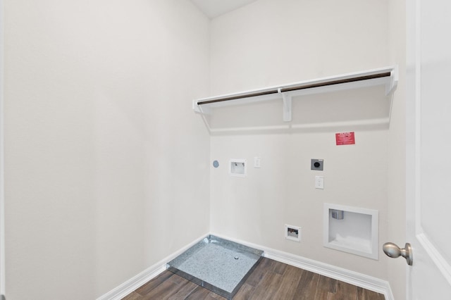 clothes washing area with hookup for a washing machine, dark wood-type flooring, gas dryer hookup, electric dryer hookup, and laundry area