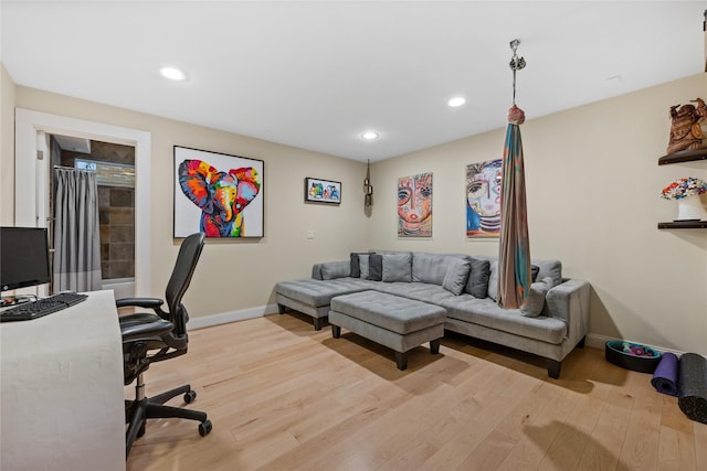 home office featuring recessed lighting, baseboards, and light wood-type flooring