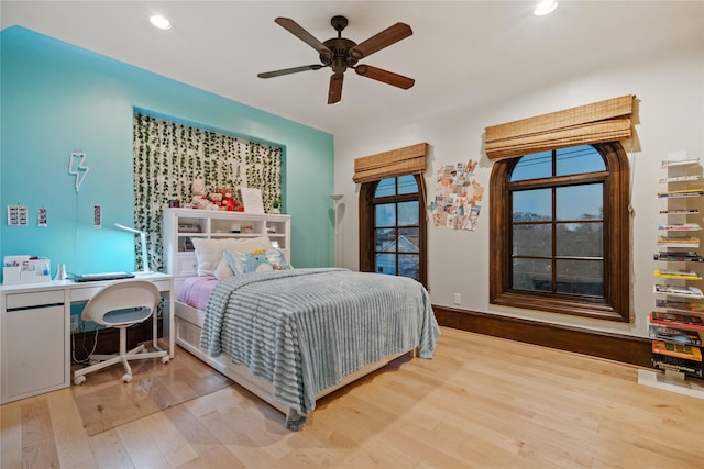 bedroom featuring recessed lighting, baseboards, ceiling fan, and wood finished floors