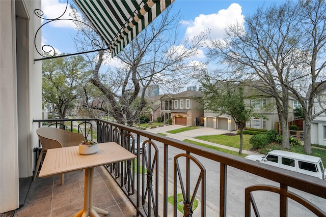 balcony featuring a residential view