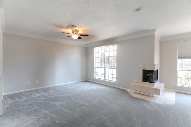 unfurnished living room with carpet flooring and ornamental molding