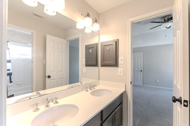 bathroom featuring a sink, visible vents, and ceiling fan