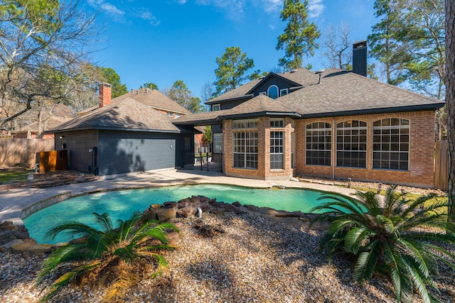 view of pool with a patio, fence, and a fenced in pool