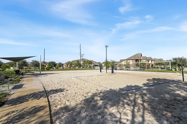 surrounding community featuring volleyball court