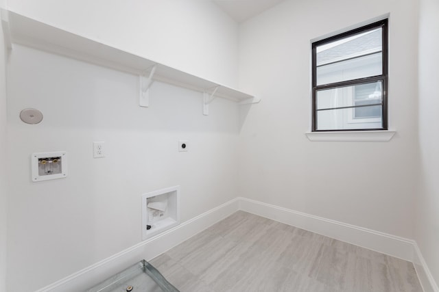 clothes washing area featuring washer hookup, laundry area, hookup for an electric dryer, and baseboards