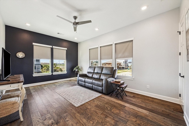 living area featuring wood finished floors, visible vents, baseboards, recessed lighting, and ceiling fan