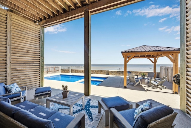 outdoor pool featuring a gazebo, a water view, outdoor lounge area, and a patio area