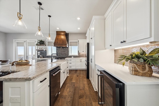 kitchen featuring premium range hood, wine cooler, dishwasher, dark wood-style floors, and high end fridge