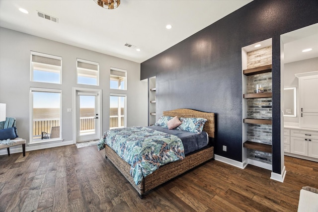 bedroom with visible vents, baseboards, dark wood finished floors, and access to outside