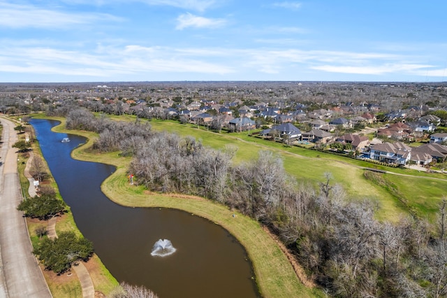 birds eye view of property featuring a water view and a residential view