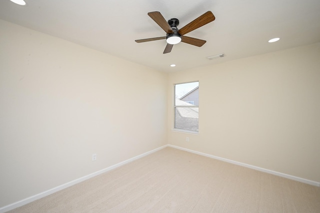 spare room with visible vents, baseboards, light carpet, recessed lighting, and a ceiling fan