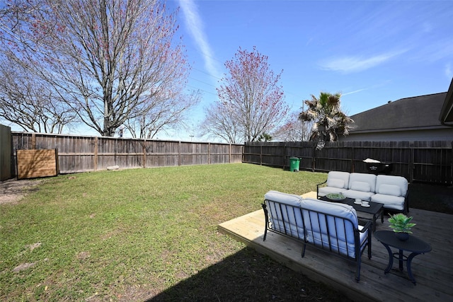 view of yard featuring an outdoor hangout area and a fenced backyard