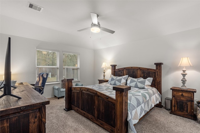 bedroom with ceiling fan, visible vents, and light colored carpet