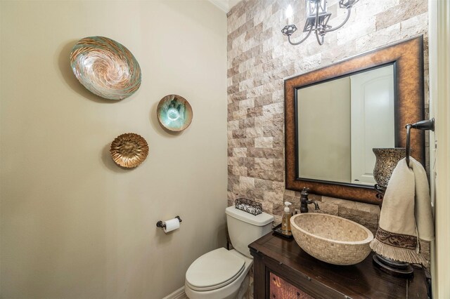 bathroom featuring toilet and vanity