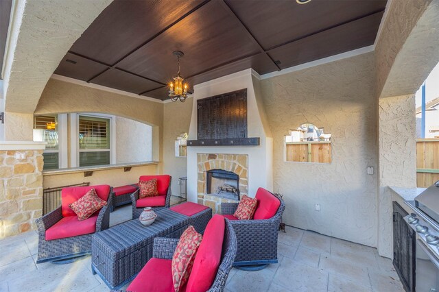 view of patio featuring an outdoor living space with a fireplace