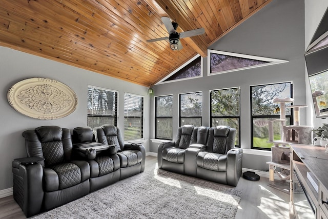 interior space with beam ceiling, wooden ceiling, baseboards, and wood finished floors