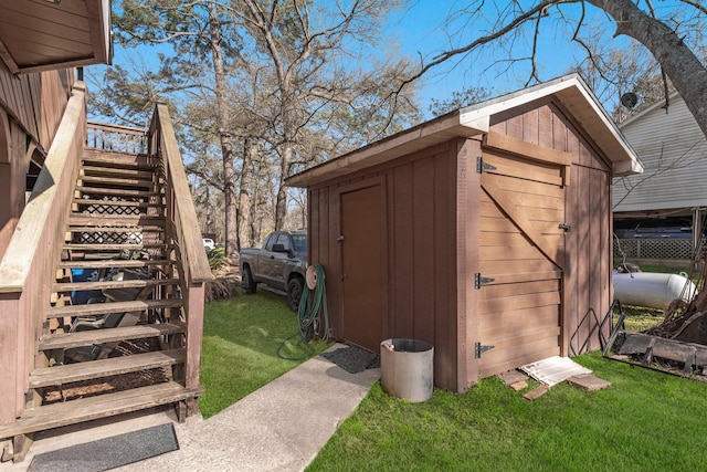 view of shed with stairway