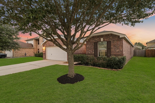 ranch-style house with a garage, driveway, brick siding, and a front lawn