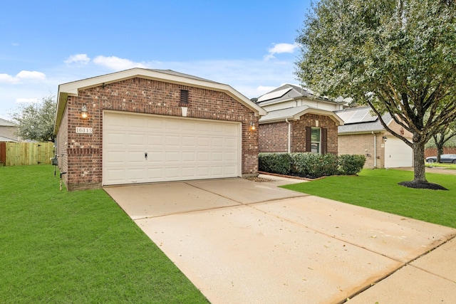 view of front of home with a garage, concrete driveway, brick siding, and a front lawn