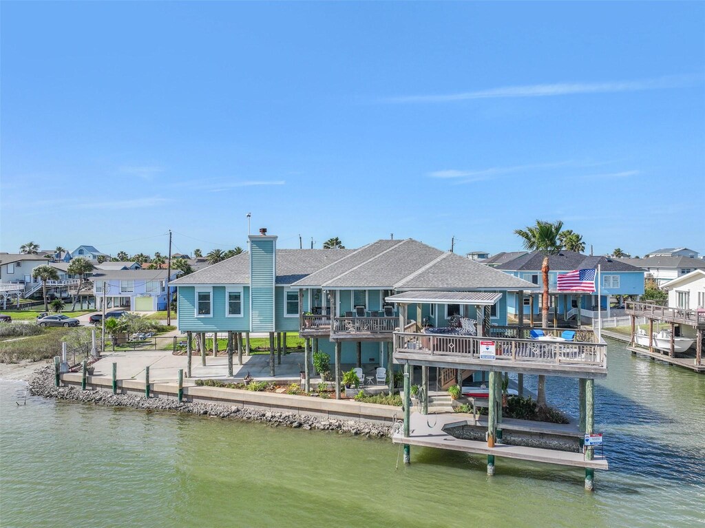 4510 Pelican Rd, Jamaica Beach, TX 77554 - dock area featuring a residential view and a water view