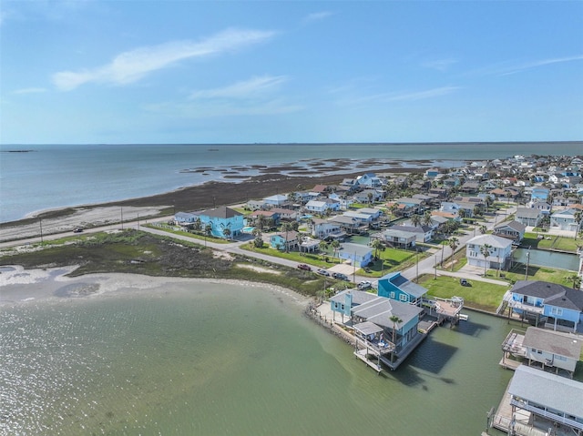 birds eye view of property with a residential view and a water view