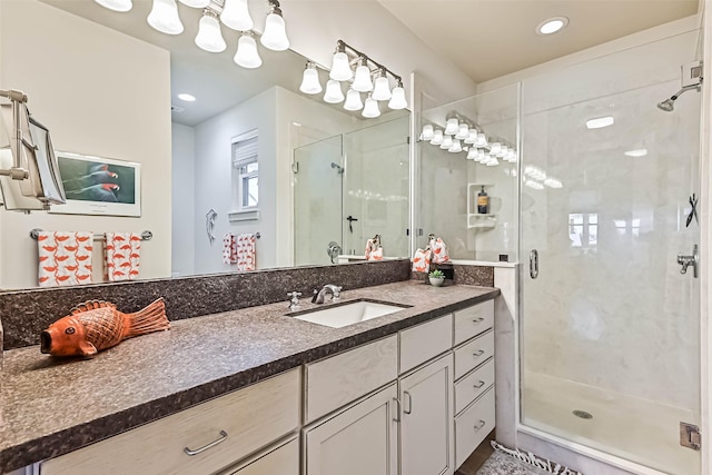 full bath featuring a shower stall, vanity, and recessed lighting