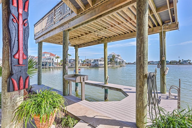 view of dock with a water view