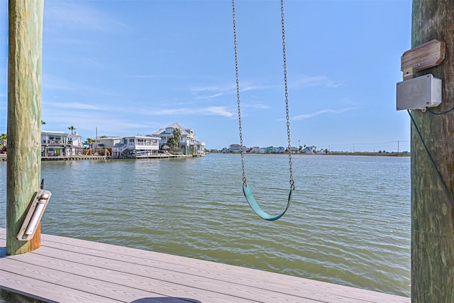 dock area with a water view