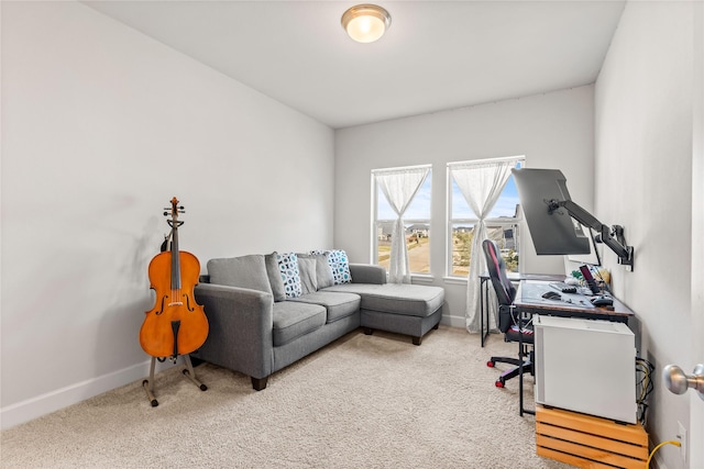 home office featuring carpet flooring and baseboards