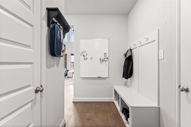 mudroom with baseboards and dark wood finished floors