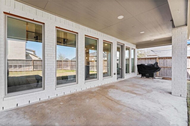 view of patio with fence