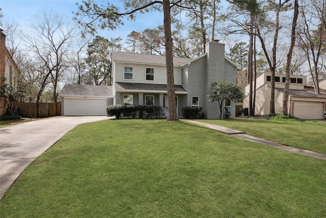 view of front facade featuring an attached garage, a chimney, fence, and a front lawn