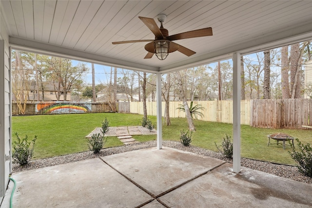 unfurnished sunroom featuring wood ceiling