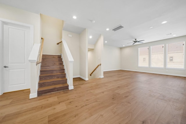 interior space featuring light wood-type flooring, visible vents, and recessed lighting