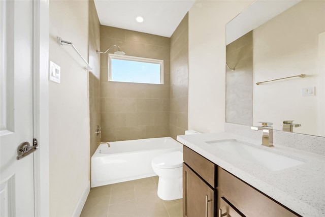 bathroom with washtub / shower combination, vanity, toilet, and tile patterned floors