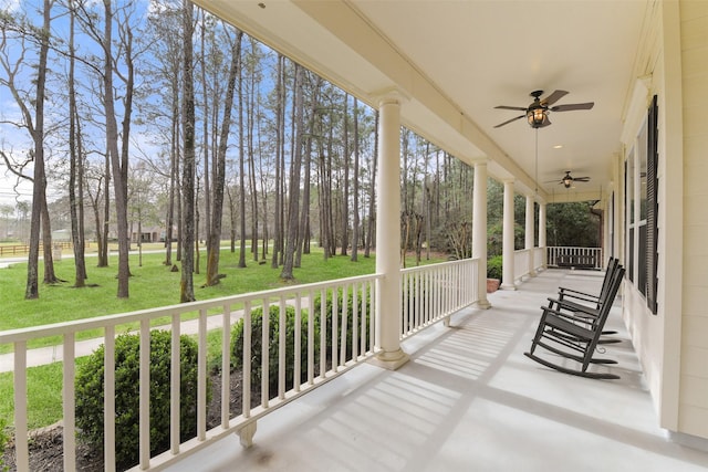 view of patio / terrace with a porch and a ceiling fan