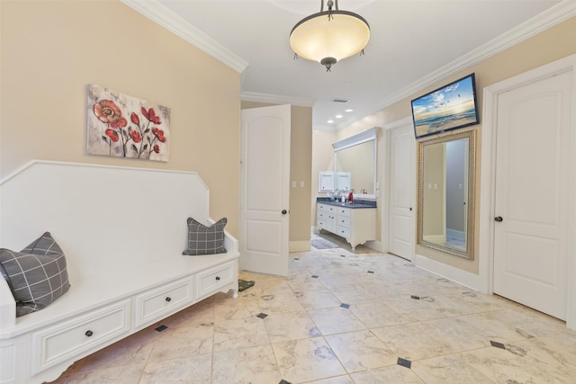 mudroom featuring baseboards and ornamental molding