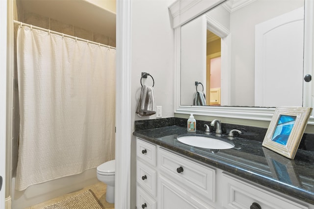 full bath featuring tile patterned floors, toilet, vanity, and shower / bath combo