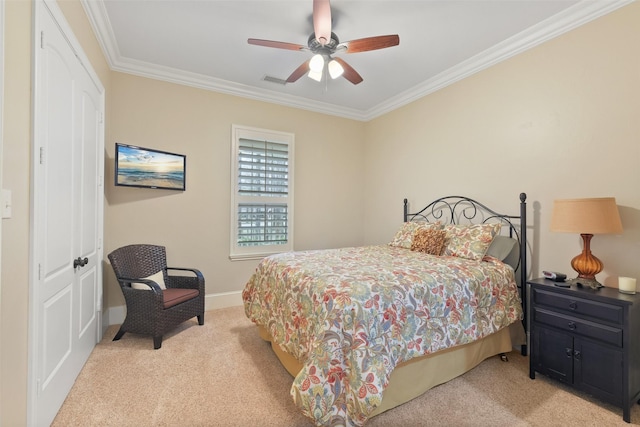 bedroom featuring baseboards, visible vents, ceiling fan, light carpet, and crown molding