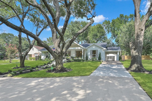 view of front of house featuring a front yard, driveway, and an attached carport