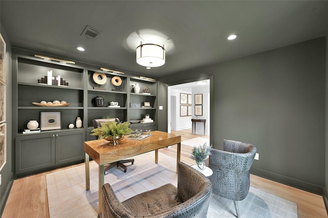 office with recessed lighting, baseboards, visible vents, and light wood finished floors