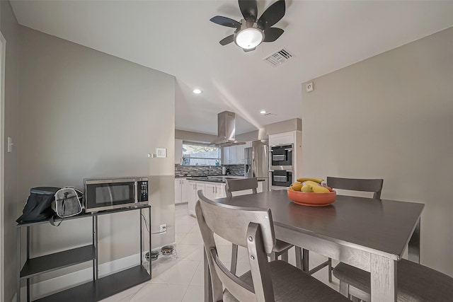 dining space with a ceiling fan, recessed lighting, visible vents, and light tile patterned floors