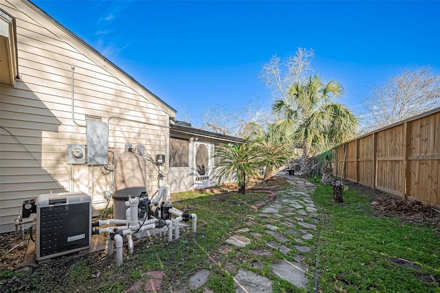 view of yard with a fenced backyard