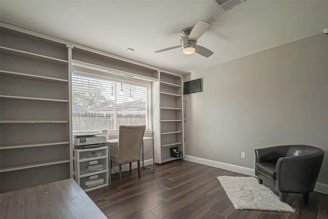 office space with baseboards, visible vents, ceiling fan, and dark wood-type flooring