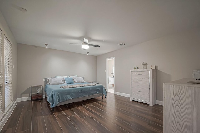 bedroom featuring baseboards, a ceiling fan, visible vents, and wood tiled floor