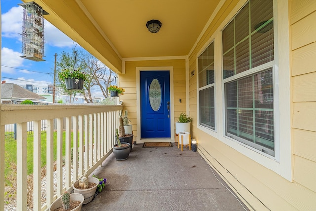 entrance to property with a porch